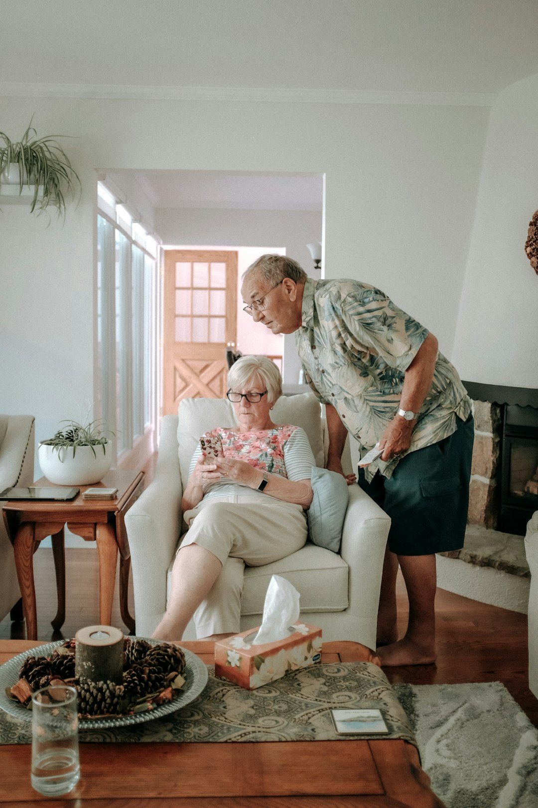 home-hero-1 a-woman-and-a-man-in-a-living-room-idbf7a9pn7s